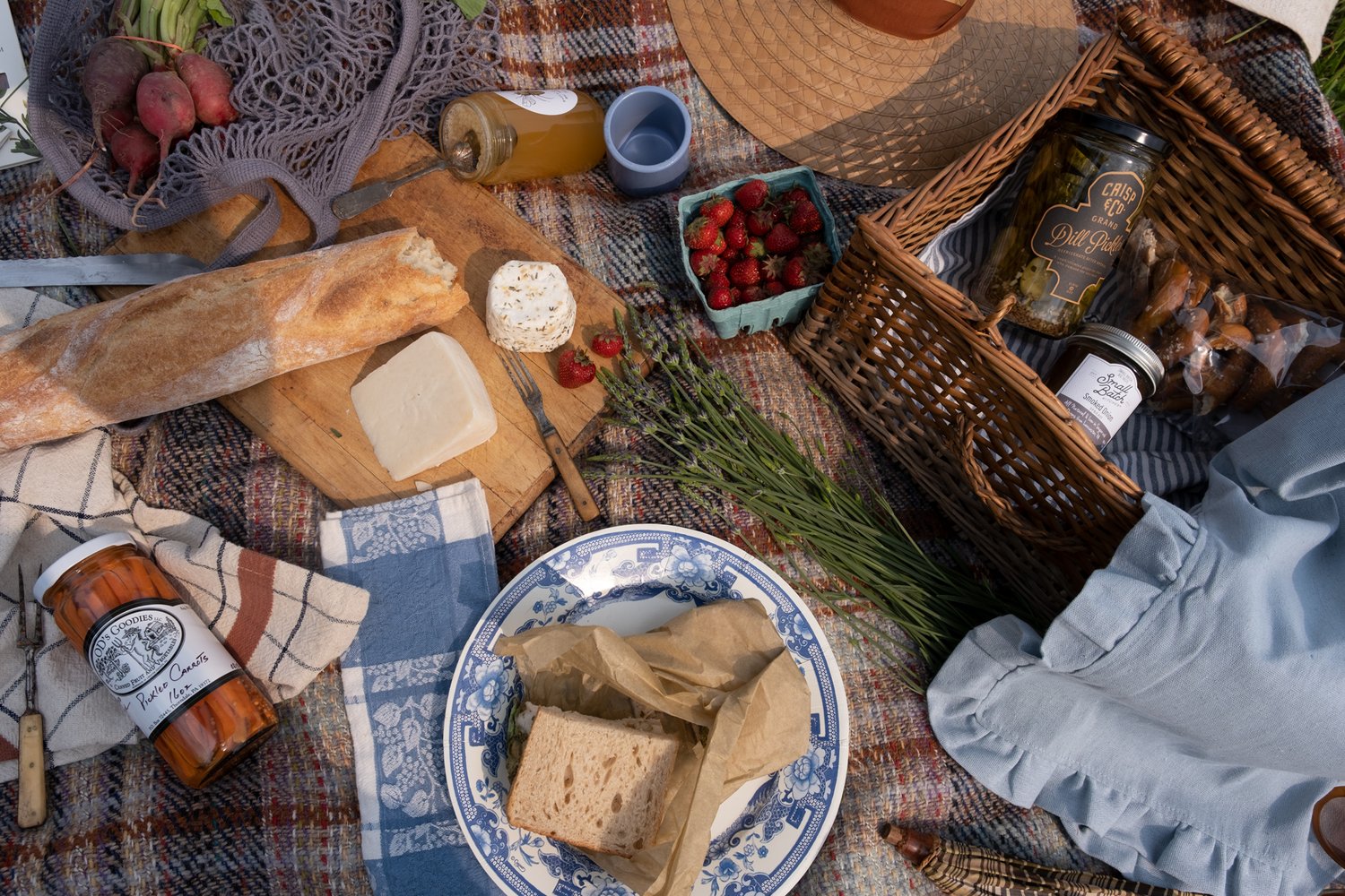 Overhead of picnic spread with local provisions on blanket